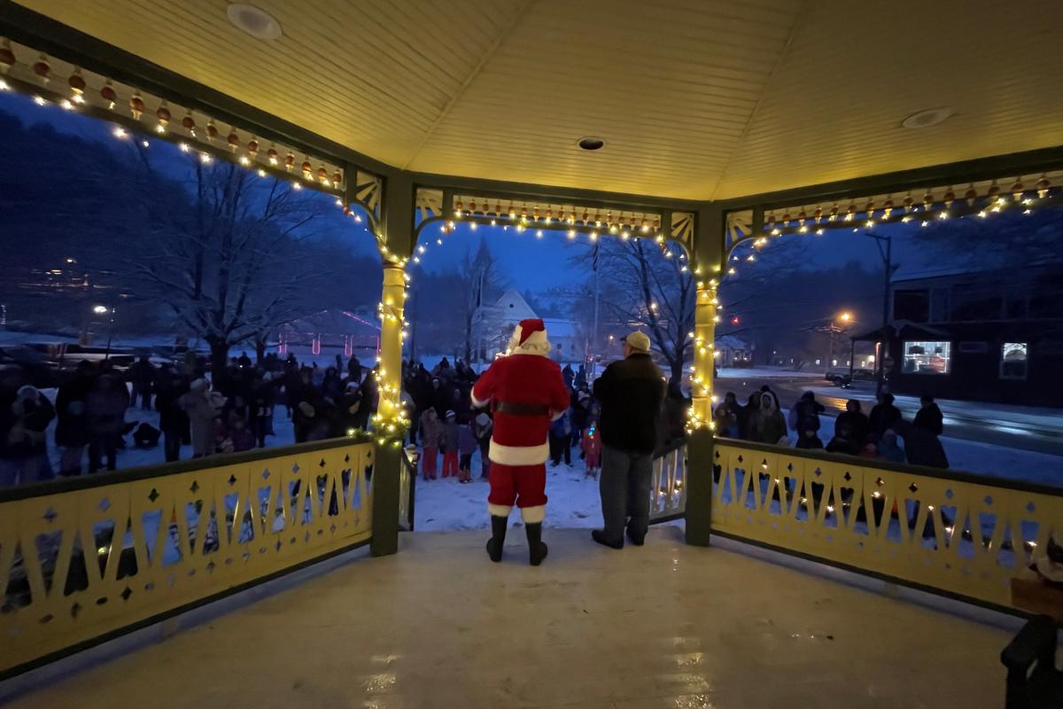 Recreation Director Mike Sindoni and Santa, great the crowd from the steps of the gazebo