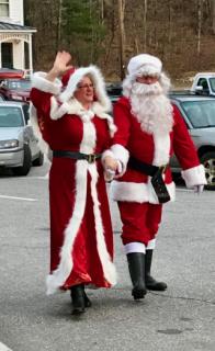 Mrs. and Mrs. Claus arrive at S'mores with Santa