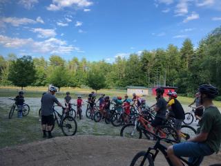 2022 Bike Clinic participants on their bikes ready to start class